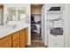 Bathroom with double sink vanity and convenient shelving, leading to walk-in closet at 564 Lampshire Ln, Pahrump, NV 89060