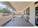 Covered patio with ample seating, perfect for outdoor entertaining and enjoying the backyard view at 564 Lampshire Ln, Pahrump, NV 89060