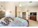 Main bedroom boasts vaulted ceilings, walk-in closet, plush carpet and lots of natural light at 5862 Bluthe Bridge Ave, Las Vegas, NV 89141