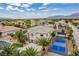 Desirable neighborhood featuring a home with a pool and sports court at 6214 Ebony Legends Ave, Las Vegas, NV 89131