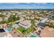 Stunning community with a two-story home, pool, desert landscaping, and beautiful views at 6214 Ebony Legends Ave, Las Vegas, NV 89131