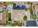 Expansive backyard featuring a pool, spa, sports court, and desert landscaping at 6214 Ebony Legends Ave, Las Vegas, NV 89131