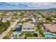Lush community with a two-story home, pool, desert landscaping, and scenic views at 6214 Ebony Legends Ave, Las Vegas, NV 89131