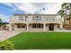 Spacious backyard features a large manicured lawn and ample patio space at 6214 Ebony Legends Ave, Las Vegas, NV 89131