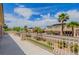 Large balcony overlooking the neighborhood featuring beautiful wrought iron railings at 6214 Ebony Legends Ave, Las Vegas, NV 89131