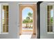 Balcony view featuring tropical palm trees and decorative railings at 6214 Ebony Legends Ave, Las Vegas, NV 89131