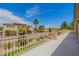 Balcony area with a decorative white wrought iron rail and neighborhood views at 6214 Ebony Legends Ave, Las Vegas, NV 89131