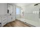 Modern bathroom featuring a glass shower, sleek fixtures, and neutral tones at 6214 Ebony Legends Ave, Las Vegas, NV 89131