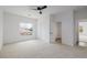 Well-lit bedroom with double-door closet and view of the neighborhood at 6214 Ebony Legends Ave, Las Vegas, NV 89131