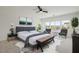Serene bedroom with ample natural light, neutral tones, and stylish furnishings at 6214 Ebony Legends Ave, Las Vegas, NV 89131