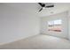 Well-lit bedroom featuring a large window and views of the neighborhood at 6214 Ebony Legends Ave, Las Vegas, NV 89131