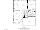 Detailed floor plan showcasing the layout of the home's first floor, including kitchen, living room, and garage at 6214 Ebony Legends Ave, Las Vegas, NV 89131