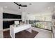 Modern office area with custom shelving, wet bar, and lots of natural light at 6214 Ebony Legends Ave, Las Vegas, NV 89131