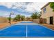Outdoor sports court perfect for basketball, pickleball and other fun games at 6214 Ebony Legends Ave, Las Vegas, NV 89131