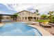 Backyard swimming pool with jacuzzi, fire pit, and sports court at 6214 Ebony Legends Ave, Las Vegas, NV 89131