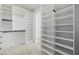 Spacious walk-in closet featuring ample shelving and storage for shoes and clothing at 6214 Ebony Legends Ave, Las Vegas, NV 89131