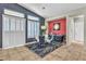 Bright dining area featuring large windows with shutters, stylish decor, and a contemporary rug at 6227 Orto Vaso Ave, Las Vegas, NV 89131