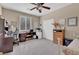 Bedroom featuring a ceiling fan, window and closet at 6567 American Eagle Ave, Las Vegas, NV 89131