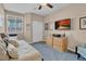 Cozy bedroom featuring a daybed, wood dresser, and ceiling fan at 6567 American Eagle Ave, Las Vegas, NV 89131