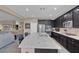 Kitchen with stainless steel appliances, spacious island, and open layout at 6567 American Eagle Ave, Las Vegas, NV 89131