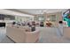 Bright and airy living room with neutral decor, offering a comfortable seating area and ample natural light at 6567 American Eagle Ave, Las Vegas, NV 89131