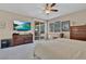 Large main bedroom with slider door out to the covered patio at 6567 American Eagle Ave, Las Vegas, NV 89131