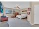 Spacious main bedroom with carpet, ceiling fan, and outside views at 6567 American Eagle Ave, Las Vegas, NV 89131