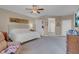 Bright main bedroom suite features neutral tones and access to ensuite bath at 6567 American Eagle Ave, Las Vegas, NV 89131