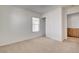 Neutral bedroom with a large window and a closet, offering ample storage space at 6622 Colorado Spruce St, Las Vegas, NV 89149