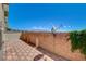 Tiled patio with block wall and satellite dish, overlooking mountains at 6622 Colorado Spruce St, Las Vegas, NV 89149