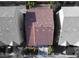 Overhead view of a home with a terra cotta roof and lush landscaping at 6726 Glissando Ct, Las Vegas, NV 89139