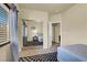 Cozy bedroom with a sliding door closet, a comfortable bed, and natural light from the window at 6726 Glissando Ct, Las Vegas, NV 89139