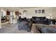Open living room area showcasing the kitchen and dining area at 6726 Glissando Ct, Las Vegas, NV 89139