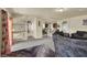 Open floorplan featuring living room flowing into kitchen and dining area at 6726 Glissando Ct, Las Vegas, NV 89139