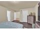 Bright main bedroom offering a large bed and ample natural light from the windows at 6726 Glissando Ct, Las Vegas, NV 89139