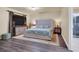 Comfortable main bedroom features a large bed, stylish decor, and ample natural light at 6726 Glissando Ct, Las Vegas, NV 89139