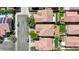 Aerial view of a neighborhood with swimming pools, desert landscaping and a community atmosphere at 7042 Grand Junction Ave, Las Vegas, NV 89179