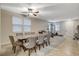 Dining area with tile flooring, comfortable seating, and natural light at 7042 Grand Junction Ave, Las Vegas, NV 89179