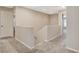 Upstairs hallway featuring neutral colors and carpet flooring at 7042 Grand Junction Ave, Las Vegas, NV 89179