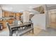 Inviting living space shows seamless kitchen, dining, and staircase access for easy living at 7042 Grand Junction Ave, Las Vegas, NV 89179