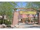 Community playground structure at Mountain's Edge, offering a safe and fun recreational area for children at 7042 Grand Junction Ave, Las Vegas, NV 89179