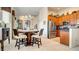A charming dining area, seamlessly connected to the kitchen, with a decorative screen for privacy and style at 711 Golden Sedum Dr, Henderson, NV 89011