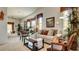 Bright living room with neutral tones, comfortable seating, and elegant decor at 711 Golden Sedum Dr, Henderson, NV 89011