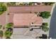 Birds-eye view showing a well maintained roof of a house with surrounding desert landscape at 7152 Fairwind Acres Pl, Las Vegas, NV 89131