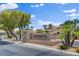 Amberly community entrance with landscaped features creates an appealing first impression for residents and visitors alike at 7152 Fairwind Acres Pl, Las Vegas, NV 89131