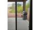 Back patio with a grill and view of the desert landscaping and surrounding mountains at 7152 Fairwind Acres Pl, Las Vegas, NV 89131
