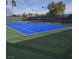 A well-maintained tennis court offers a recreational amenity for active residents and sports enthusiasts at 7152 Fairwind Acres Pl, Las Vegas, NV 89131