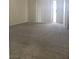 Living room featuring carpet and sliding glass doors to the outside at 7300 Pirates Cove Rd # 2025, Las Vegas, NV 89145