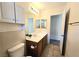 Bathroom with a modern vanity, and a mirrored wall cabinet at 7319 Burnt Umber St, Las Vegas, NV 89139