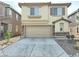 Attractive two-story home featuring a spacious two-car garage and landscaped front at 7319 Burnt Umber St, Las Vegas, NV 89139